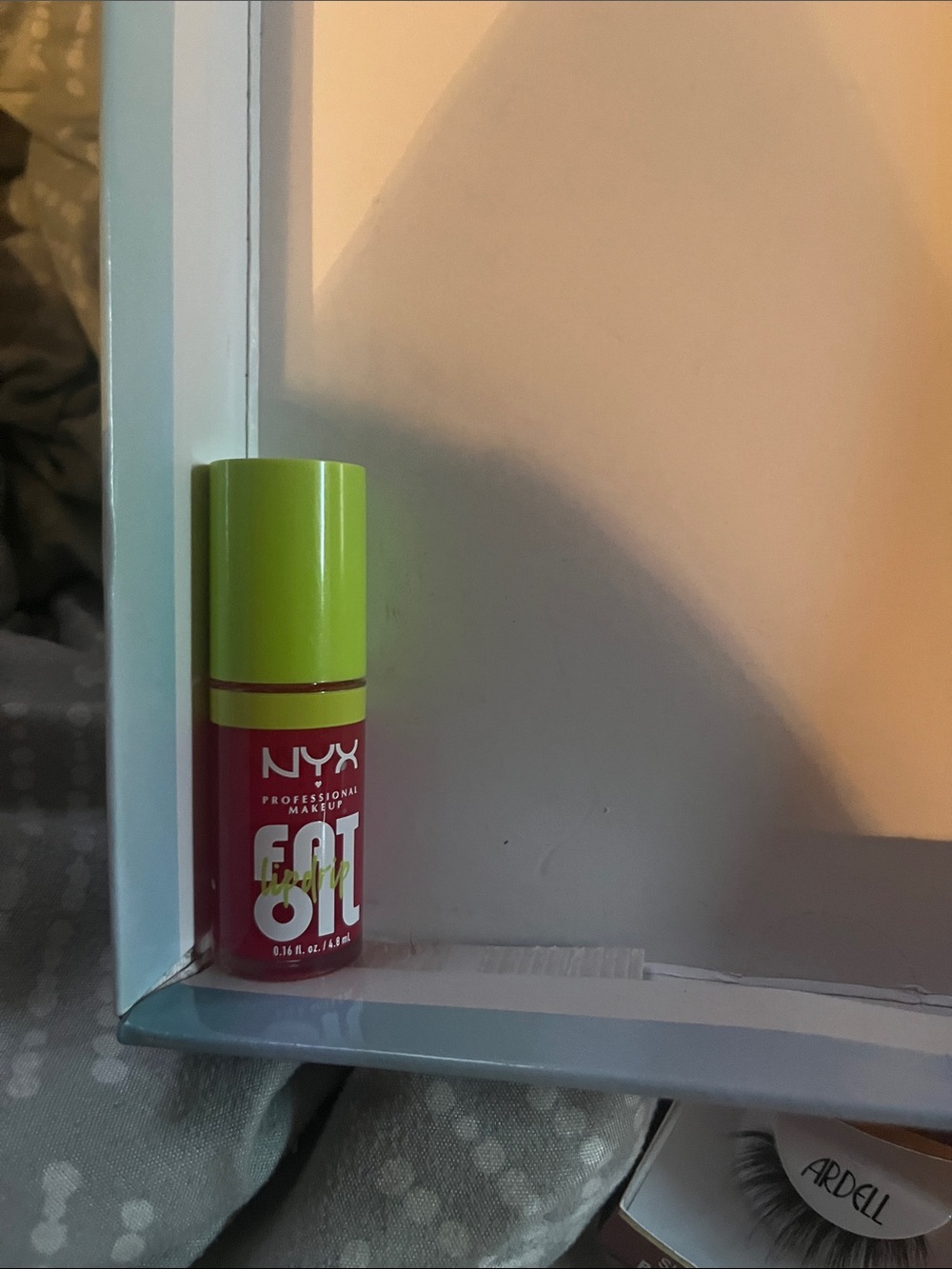 NYX Lip Oil - Lime Green Cap with Red Bottle